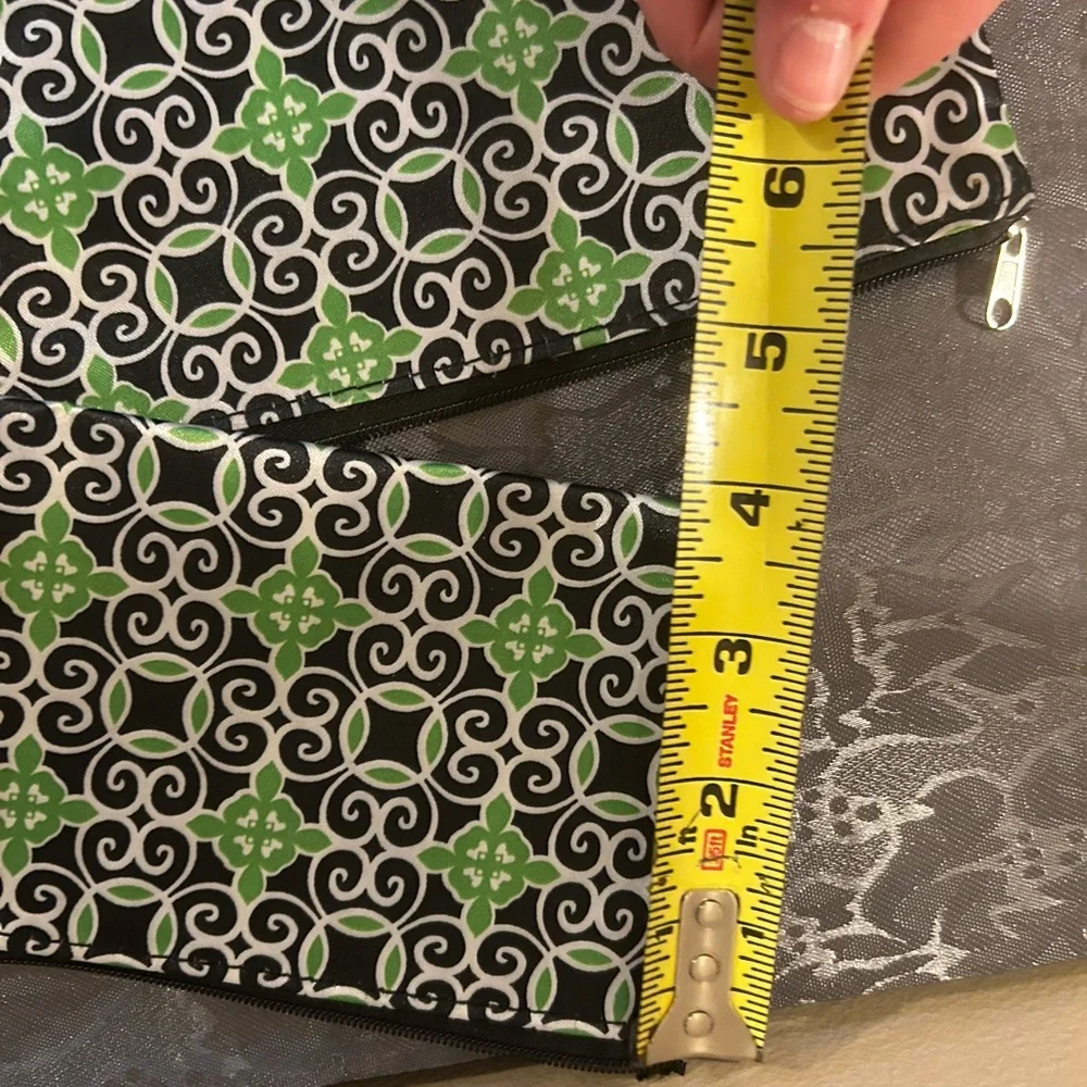 Sassy & Chic cosmetic bags featuring a green, black, and white geometric tile